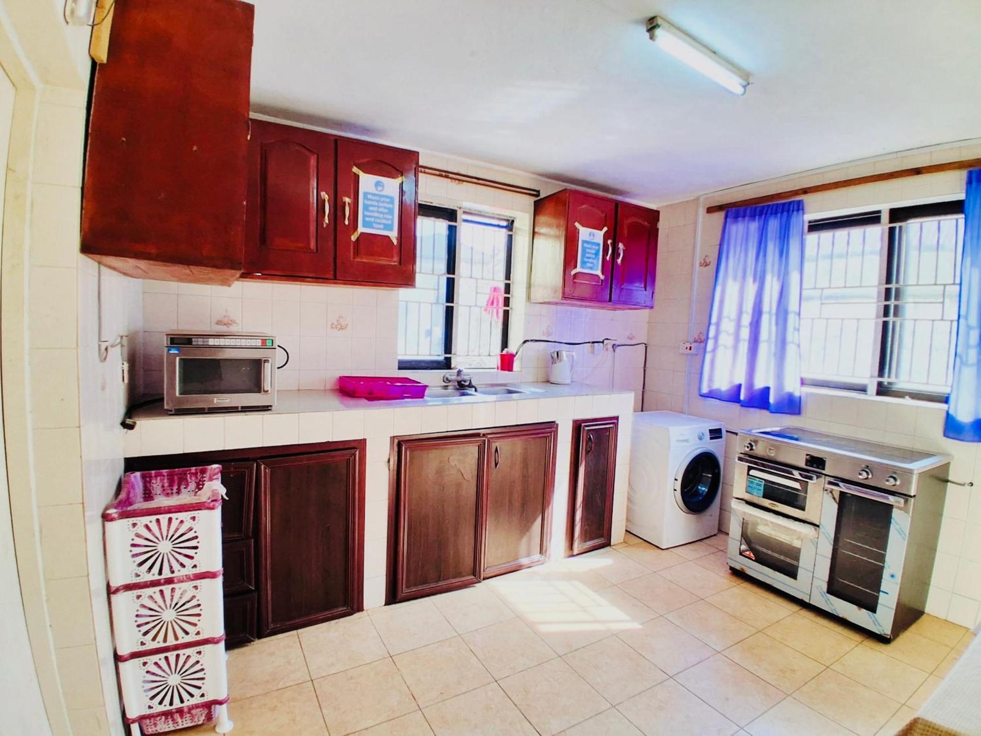 Zunox Guest House Фрийтаун Екстериор снимка